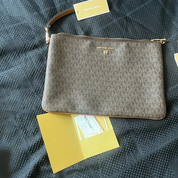 Michael Kors Brown Messenger Bag with Monogram Pattern
